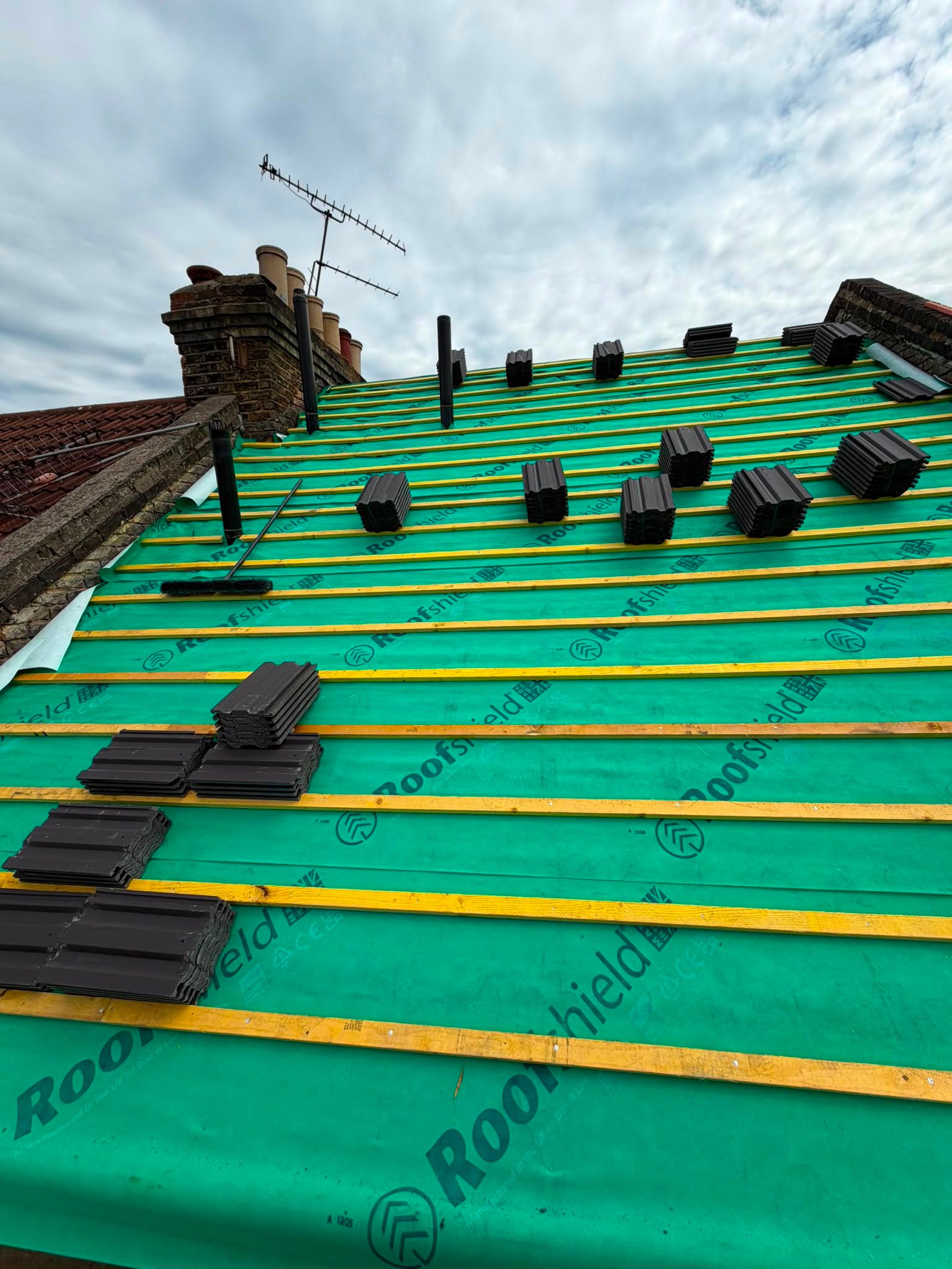 Completed slate style new roof